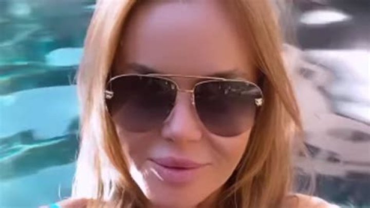 Amanda Holden stuns in a plunging blue bikini on family Easter trip to the US