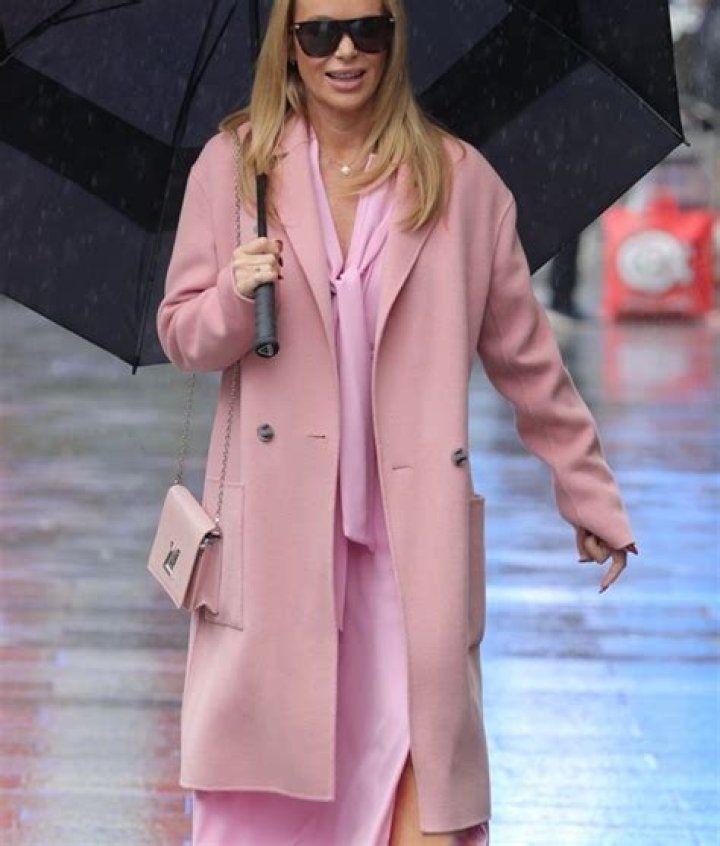 Amanda Holden stuns in a pink bikini as she sips rosé wine in her garden – The US Sun