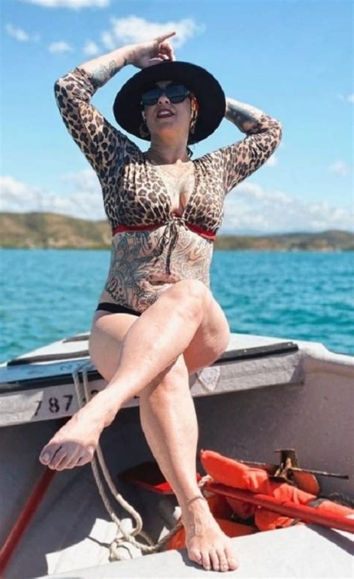 American Pickers star Danielle Colby's daughter Memphis, 20, flashes her butt in thong swimsuit to promote her OnlyFans