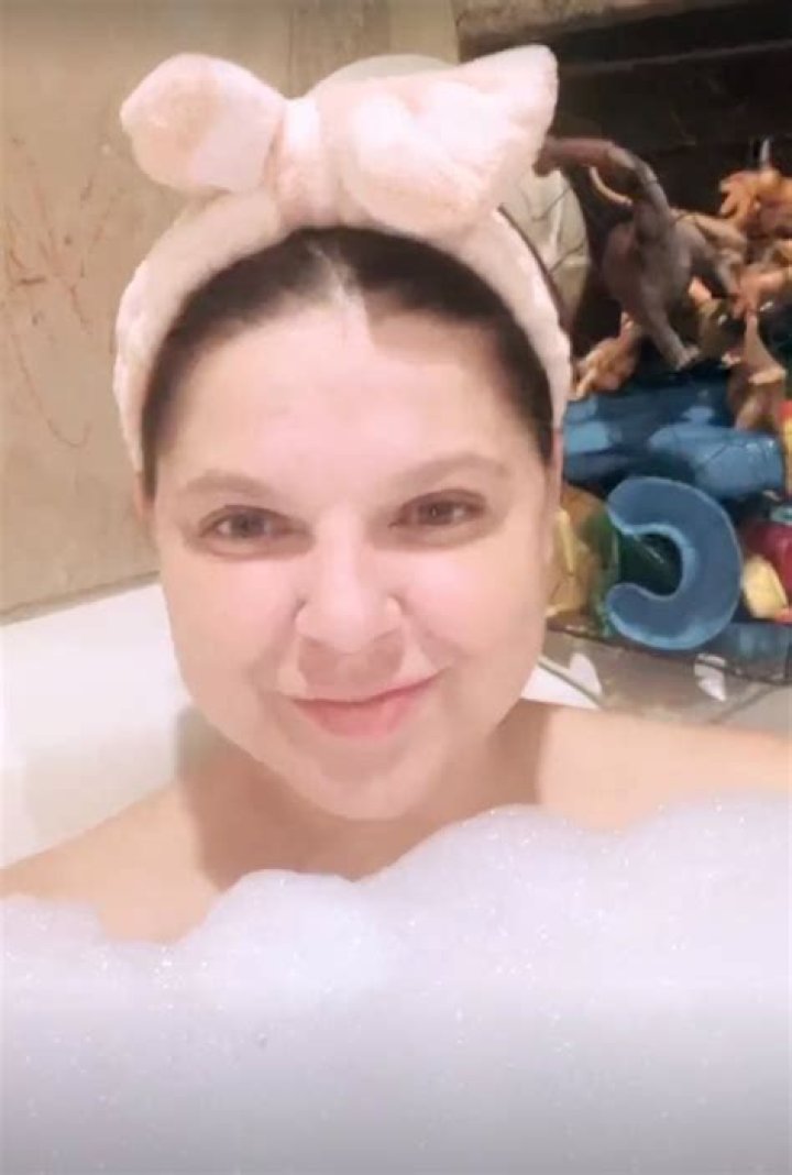 Amy Duggar defies uncle Jim Bob's rules as she shares photo of herself nude in the bathtub at her Arkansas home