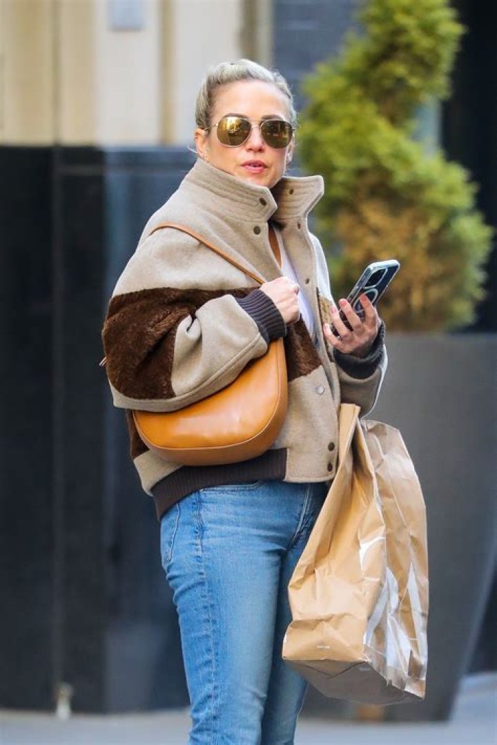 Amy Robach seen alone during NYC outing after fans spot 'red flags' in relationship with boyfriend TJ Holmes