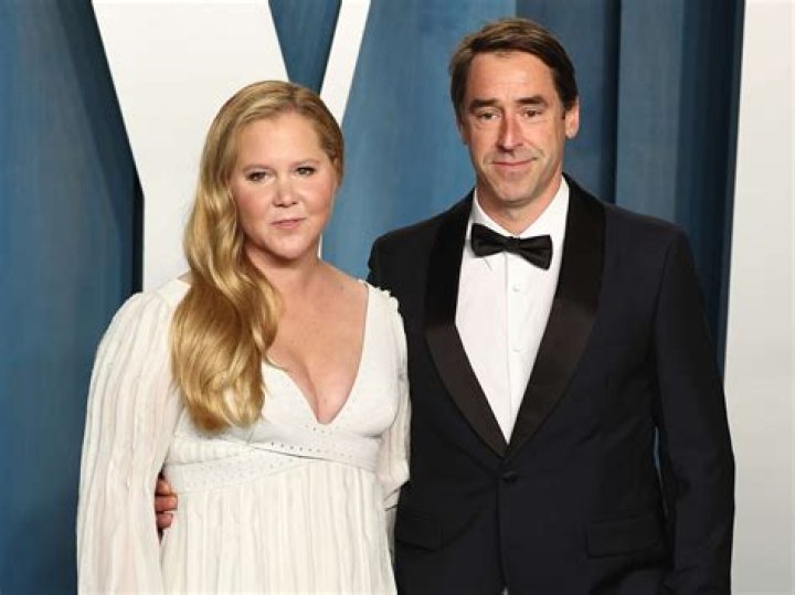 Amy Schumer's Husband Chris Fischer Loves Her 'Wild' Side 