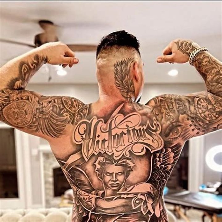 Andy Ruiz Jr shows off bizarre new tattoo which spans length of back and bum - but fans shocked by amazing shape he's in