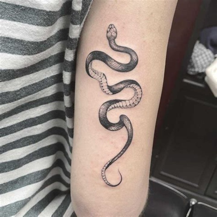 I asked for a tiny bracelet-sized tattoo and ended up with a snake up half my arm... I was too nervous to say anything