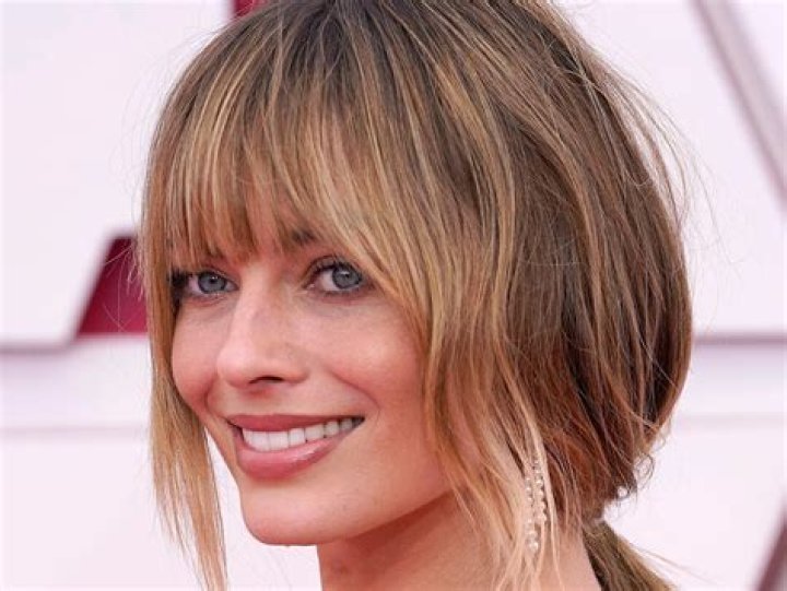 Bottleneck Bangs Are The Daintier Take On Curtain Bangs