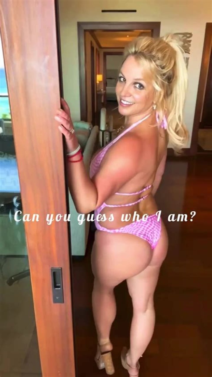 Britney Spears shows off her bare butt in yellow thong bikini after accusing Justin Timberlake of 'using her for fame'
