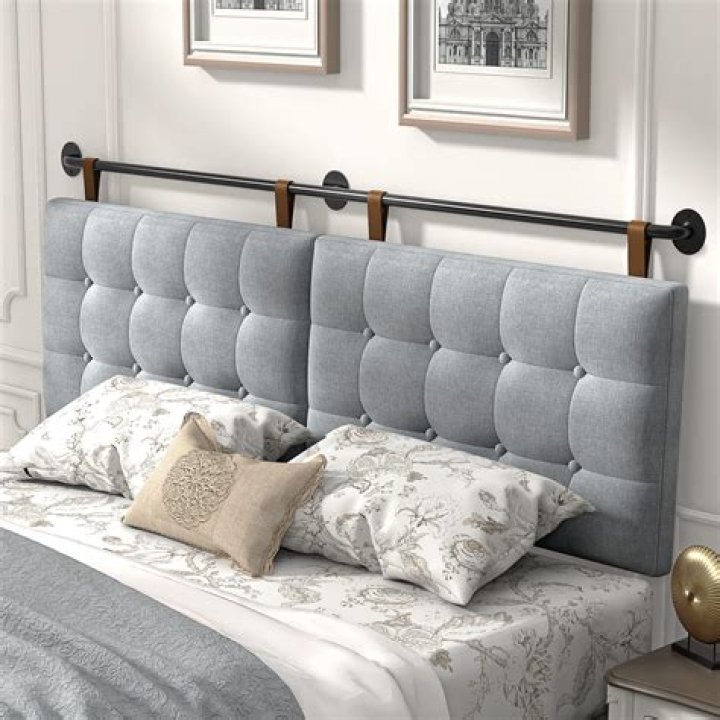 Can you use a queen size headboard on a full size bed?