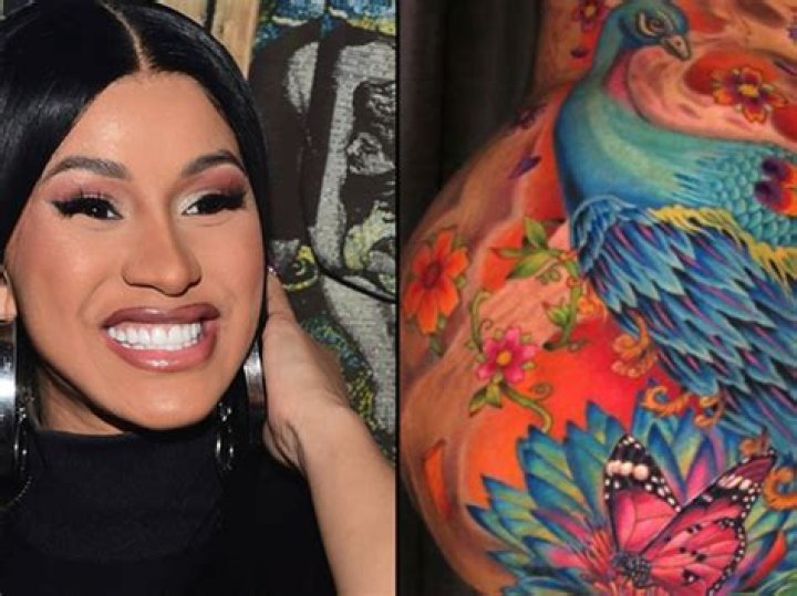 Cardi B poses nude on balcony and shows off massive peacock tattoo after ink ‘makeover’