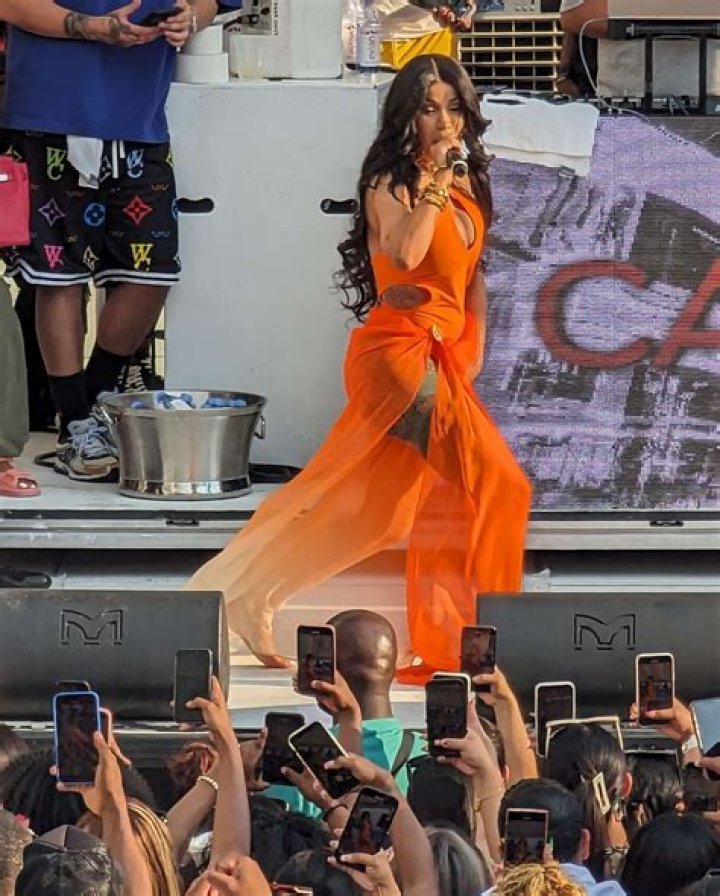 Cardi B tosses microphone after concertgoer throws drink at her on stage