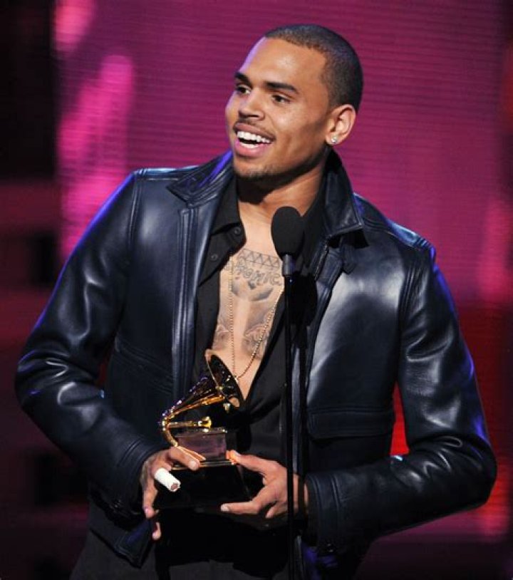 Chris Brown looks unrecognizable in new photos from Drake's Billboard Music Awards after party