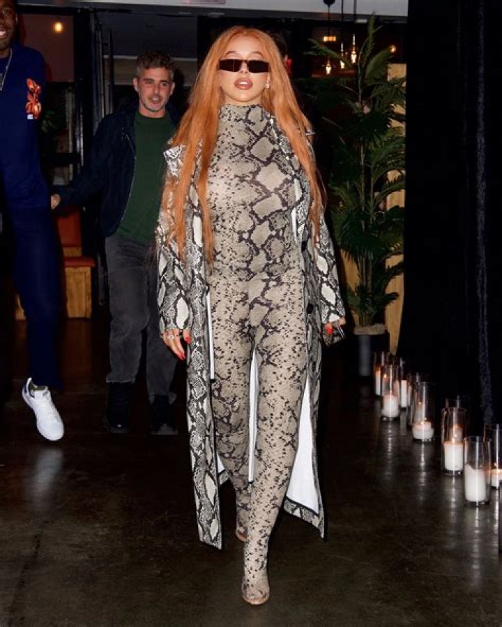 Christina Aguilera's fans think she looks unrecognizable with red hair & turquoise eyes in sexy new photo