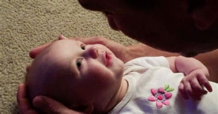 Dad sings classic song to baby daughter – the clip of her reaction is taking the internet by storm