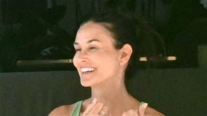 Demi Moore Enjoys Yacht Vacation in Plunging Green Swimsuit