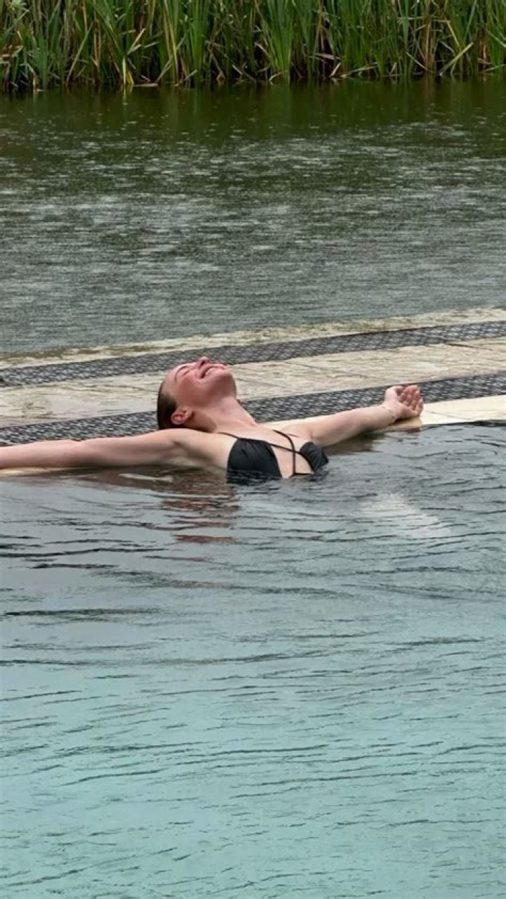 Julianne Hough wears little black bikini as she takes a plunge in the pool on break from DWTS