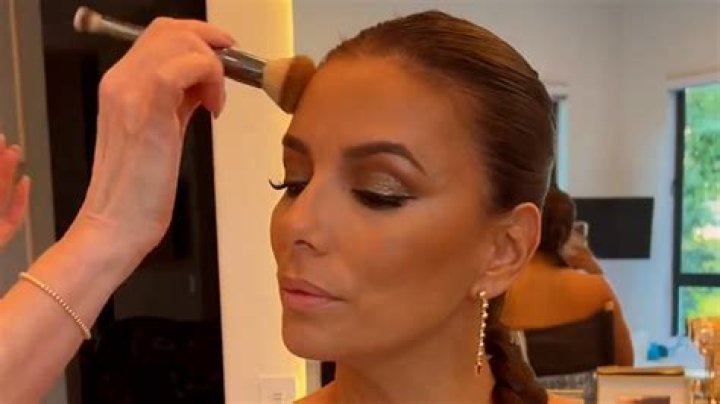 Eva Longoria, 48, flaunts ageless beauty in cleavage-baring dress while getting glammed at her $23m Beverly Hills estate