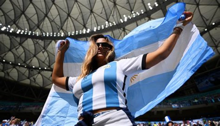 Topless Argentina supporter risks jail in Qatar as she's seen on TV stripping off to celebrate sensational World Cup win