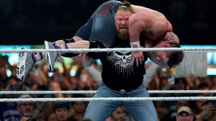 Footage Reveals Cody Rhodes Getting Helped To The Back After Brutal Brock Lesnar Attack On WWE RAW