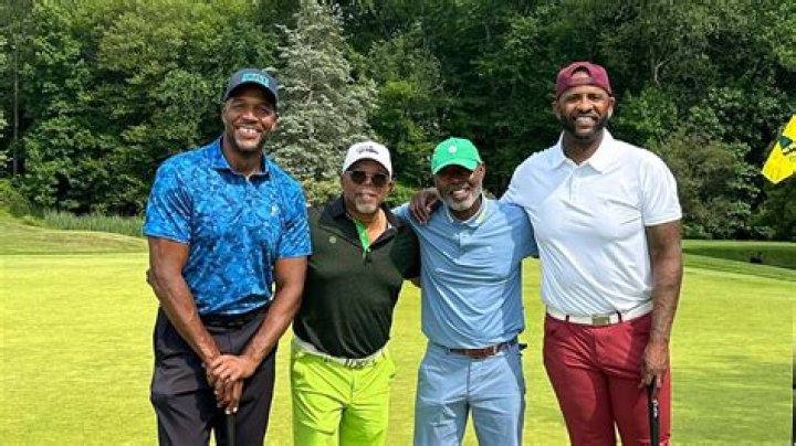 GMA's Michael Strahan kicks back for golf day with A-list pals before he's replaced by familiar face on morning show