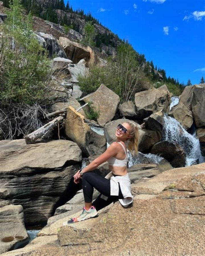 Gracie Hunt looks sensational in crop top while hiking in Aspen mountains as fans go wild for Kansas City Chiefs heiress