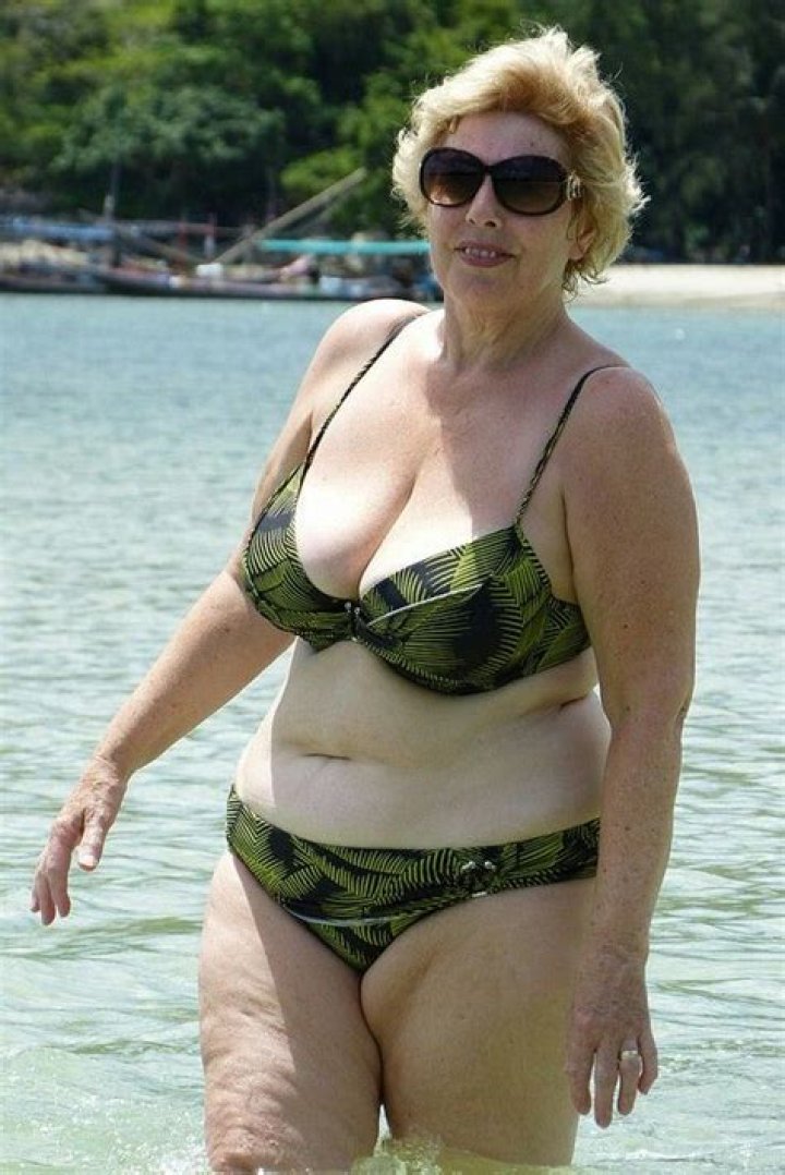 I'm a 54-year-old grandma - people say I'm stunning when I show off my cleavage in a swimsuit