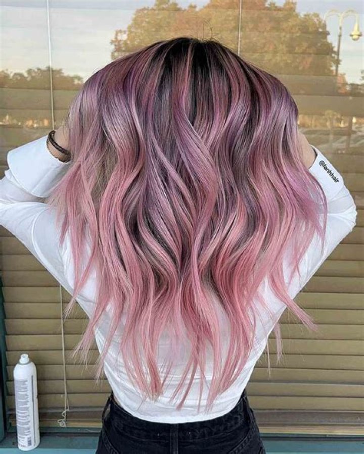 Girl horrified as hairdresser accidentally dyes hair PINK instead of bleach blonde during SEVEN hour appointment