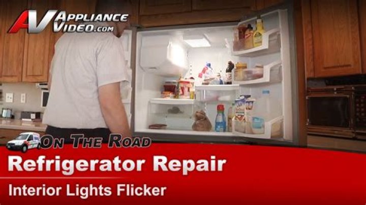 How do you change a lightbulb in a Kenmore refrigerator?