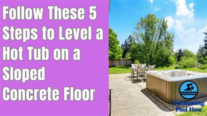 How do you level a hot tub on sloped concrete?