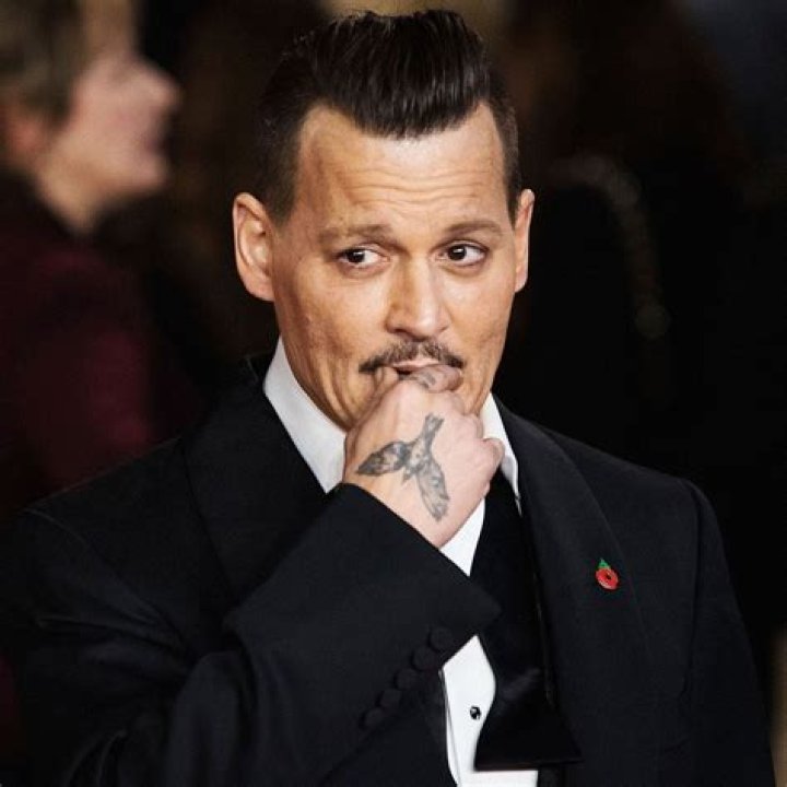 Johnny Depp Changes His Amber Heard Tattoo from ‘Slim’ to ‘Scum’