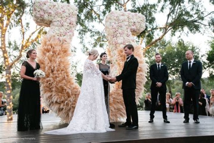 Johnny Galecki, Girlfriend Kelli Garner PDA After Cuoco Wedding: Pics