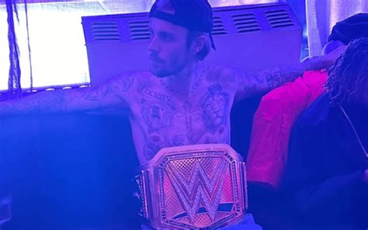 Justin Bieber Steals WWE Hall of Famer Snoop Dogg’s Golden WWE Title