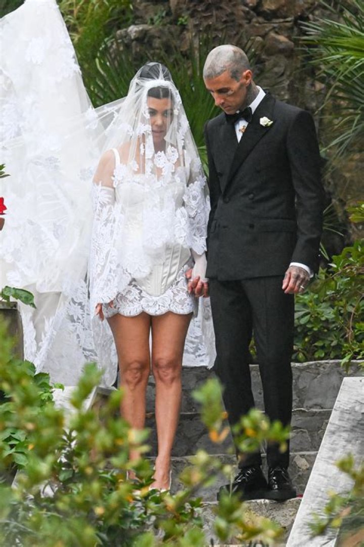 Kardashian fans pick the stunning vintage wedding dress Kourtney SHOULD have worn in Italy after seeing resurfaced video
