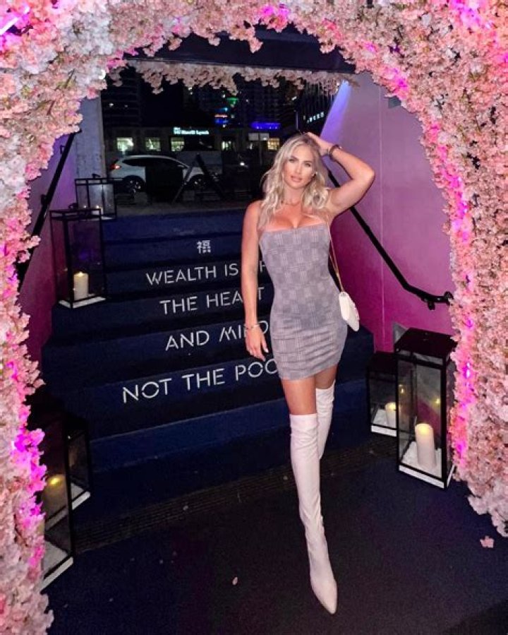 Paige Spiranac rival Karin Hart leaves fans 'weak in the knees' with stunning new photo wearing figure-hugging dress