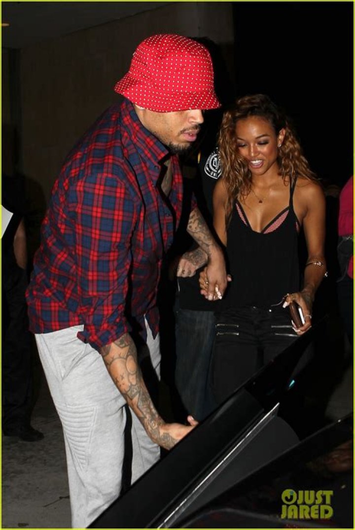 Karrueche Tran Poses Topless, Discusses Chris Brown and Rihanna Love Triangle