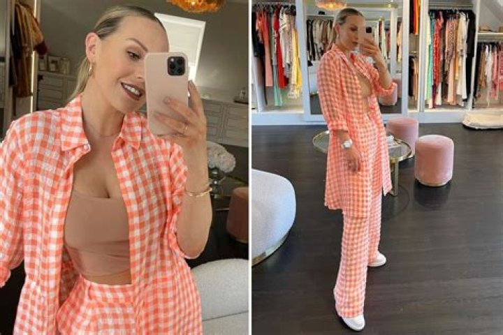 Kate Ferdinand shows off trim tum in nude crop top after admitting her body felt 'abnormal' after giving birth to son