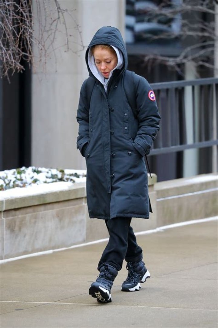 Kelly Ripa looks uncomfortable as she braves the frigid NYC snowstorm while walking around in $1.7k Canada Goose coat