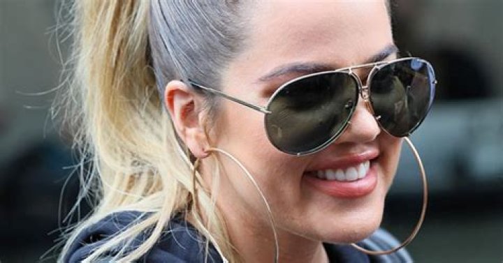 Unveiling The Glam: Khloe Kardashian's Large Hoop Earrings