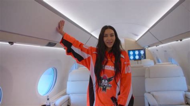 Kim Kardashian steps off $175M private 'Kim Air' jet in tiny crop top and skintight skirt for new Dolce & Gabbana ad