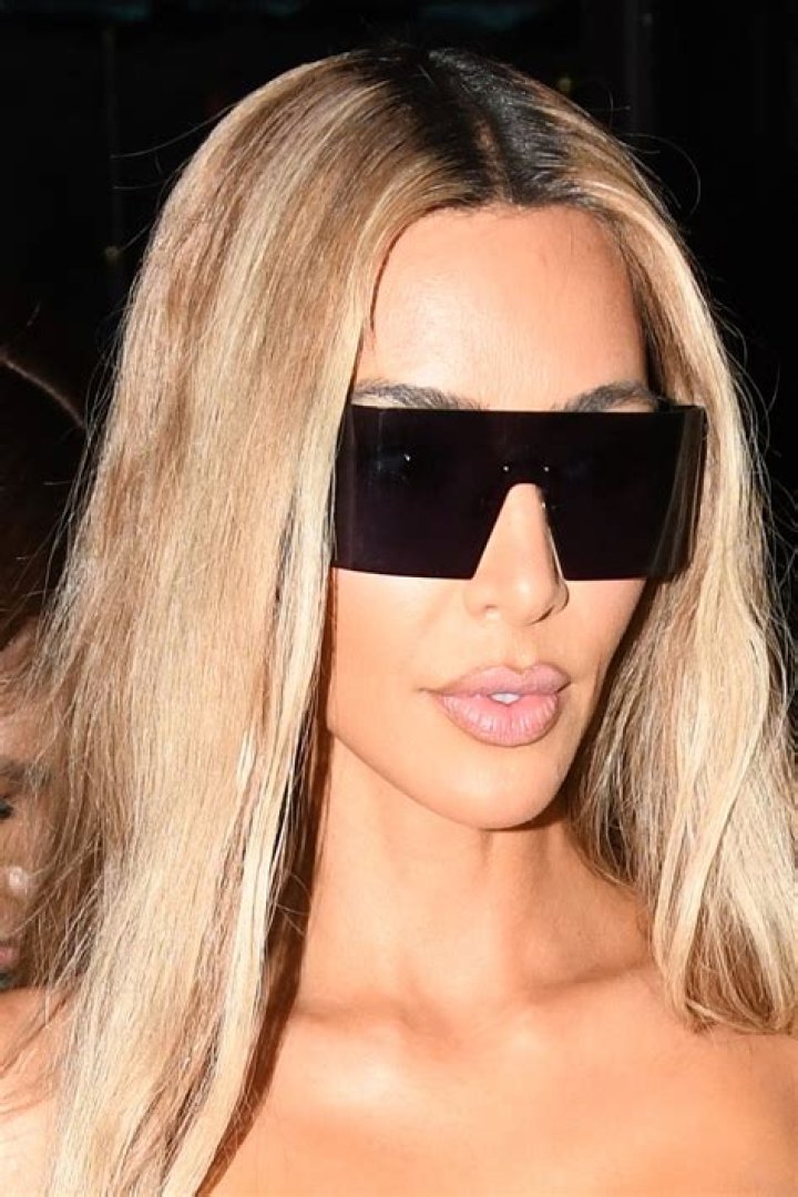 Kim Kardashian shows off dramatic hair makeover in new pics after fans demand she 'get rid of bleach blond'