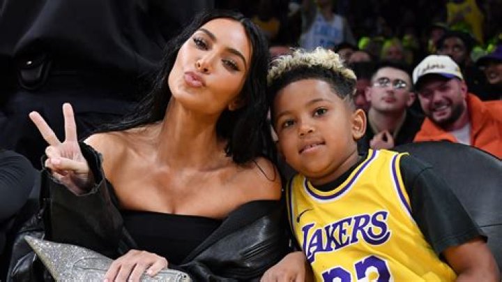 Kim Kardashian & son Saint attend LA Lakers game as she's dragged for 'wasting front row seats' with 'annoying' behavior