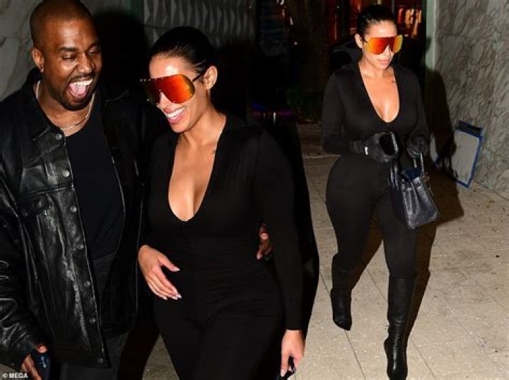 Kim Kardashian Steps Out in Skintight Black Jumpsuit With Kanye West