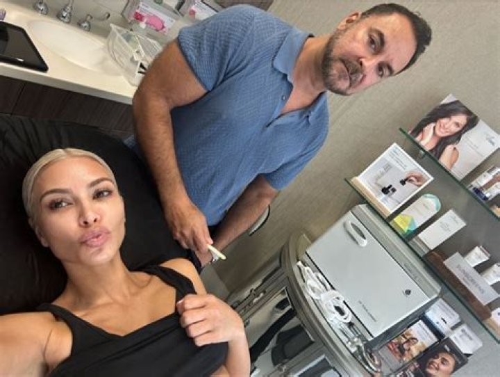 Kim Kardashian shows off tinier-than-ever bare stomach in crop top & gets weight-loss treatment in concerning new video