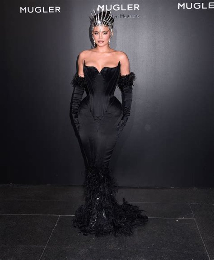 Kylie Jenner Wears Jeweled Crown, Corset Dress to Mugler Exhibit