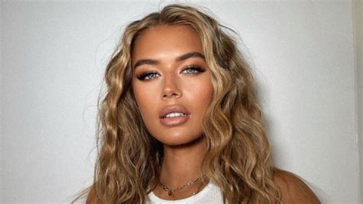 Love Island's Arabella Chi looks incredible as she strips off to barely-there bikini