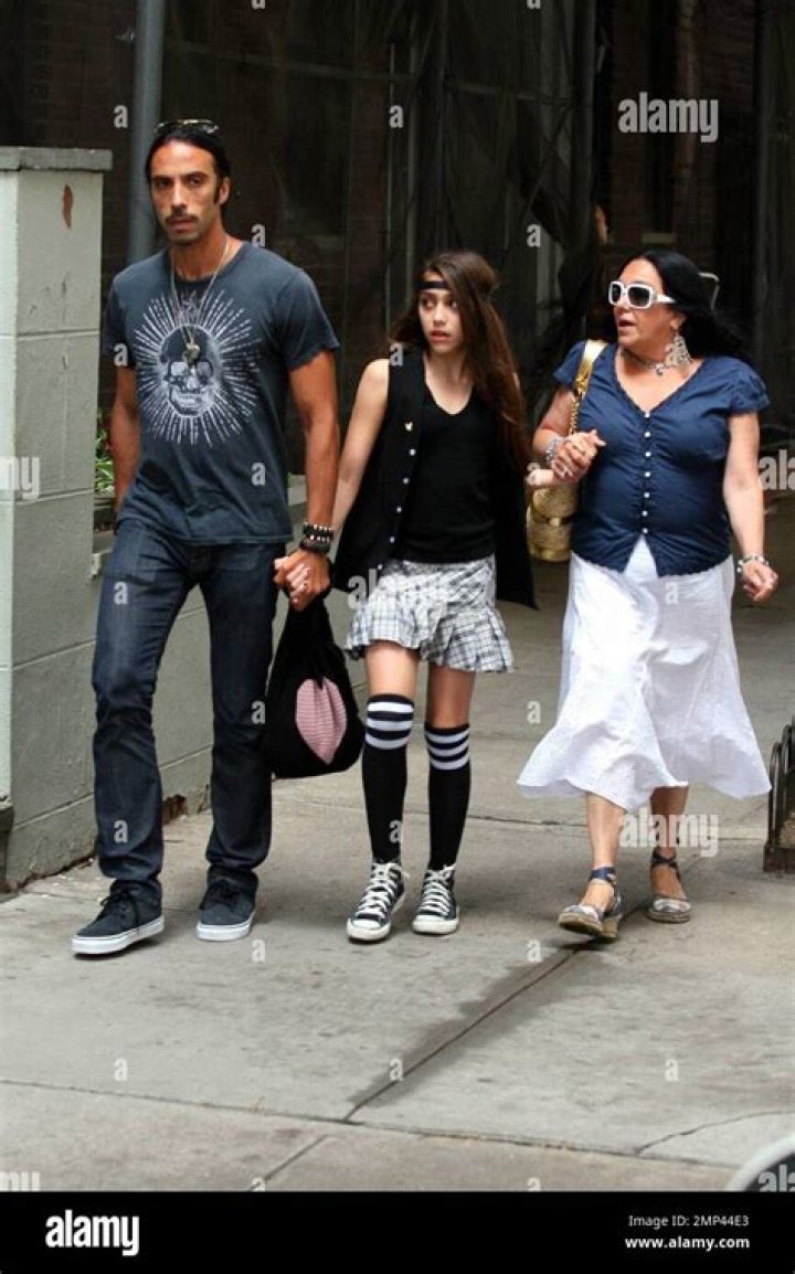 Madonna's daughter Lourdes Leon, 24, shows off fit figure in bikini as she kisses boyfriend on romantic tropical getaway