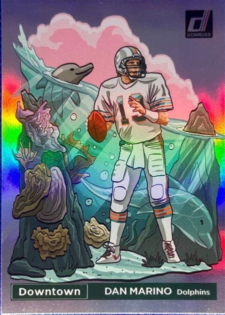 Mississippi woman brings dad to tears as she buys back rookie Dan Marino card he sold to provide for family 30 years ago