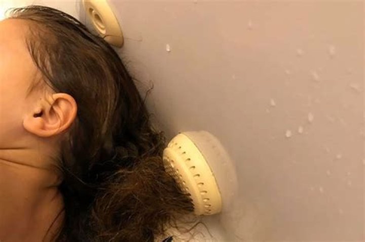 Mum shares terrifying moment daughter, 8, got her hair stuck in the jacuzzi bath valve but managed to scream for help