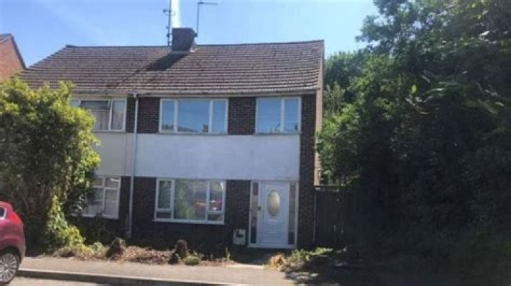 We HATE our neighbour's eyesore 'wonky' house - we want it gone now