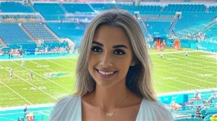 NFL fans left in awe of busty social media influencer at Miami Dolphins game - but she doesn't even exist
