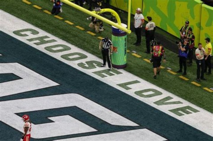Why do NFL helmets have 'Choose Love' written on them?