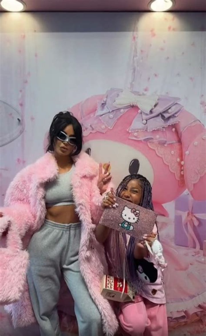 North West, 10, debuts jaw-dropping new hair that's so long mom Kim Kardashian can jump rope with it on Japan trip